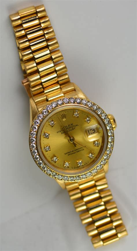 women's Rolex with diamond bezel